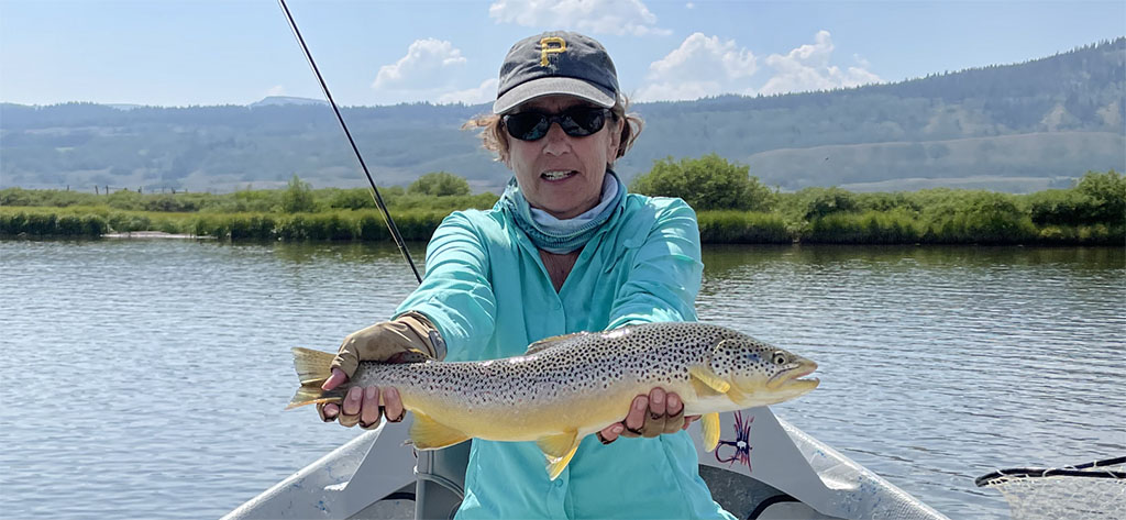 Reel Women Fly Fishing Adventures Green River, WY angler with brown Trout